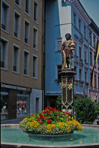 Low angle view of statue against building