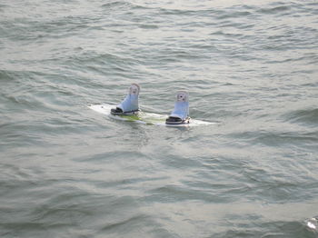 People swimming in sea