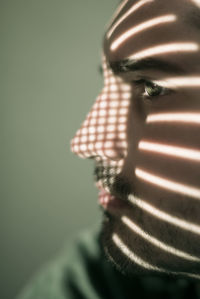 Close-up of young bearded man