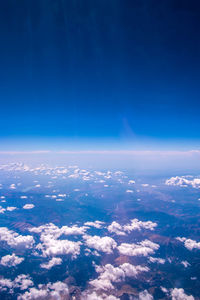 Aerial view of cloudscape against blue sky