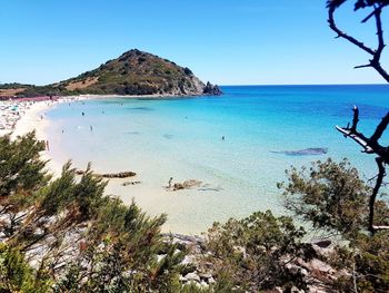 Scenic view of sea against clear blue sky