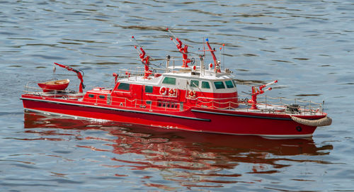 Remote controlled ship model is remote controlled on a lake