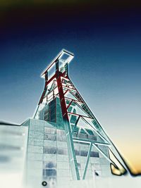 Low angle view of windmill against clear sky