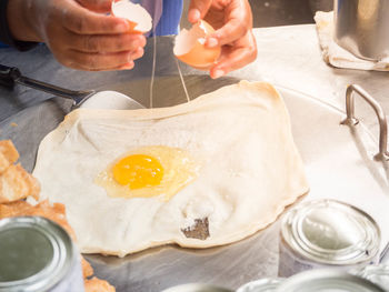 High angle view of man preparing food