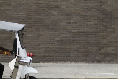 Bicycle against brick wall