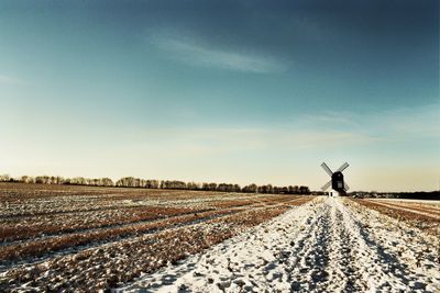 Windmill against sky