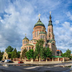 View of building against cloudy sky