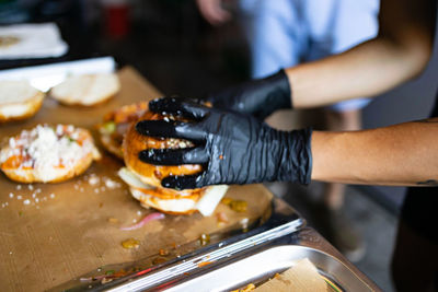 Midsection of man preparing food