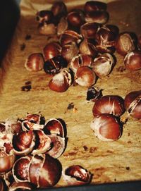 Close-up of garlic on wooden table