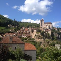 Town against cloudy sky