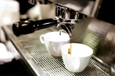 Close-up of coffee cup on table in cafe