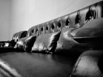 Close-up of sofa on table