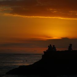 Scenic view of sea at sunset