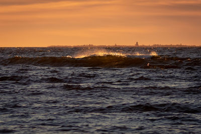 Scenic view of sea against sky during sunset