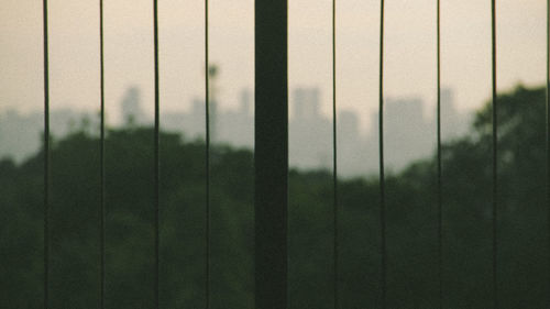 Full frame shot of field seen through fence