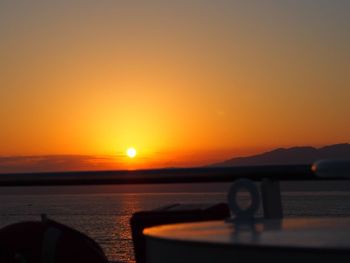 Scenic view of calm sea at sunset