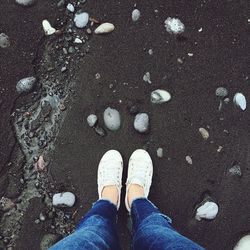 Low section of man standing on floor