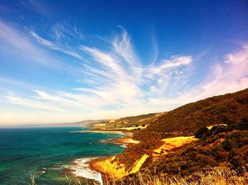 Scenic view of sea against blue sky