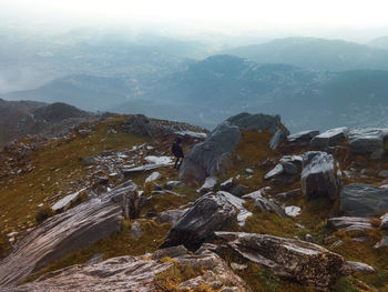 Scenic view of mountains against sky during foggy weather