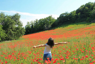 Woman standing on field