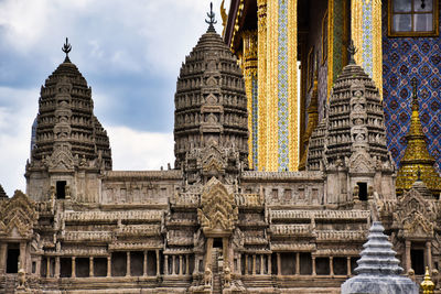 Low angle view of temple against building