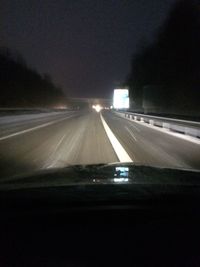 Cars moving on road at night