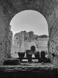 Historic building seen through arch