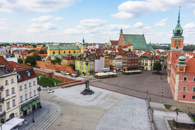 High angle view of buildings in city against sky