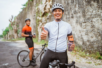 Portrait of senior man riding bicycle