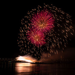 Firework display at night