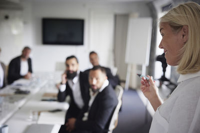 Woman having presentation at business meeting