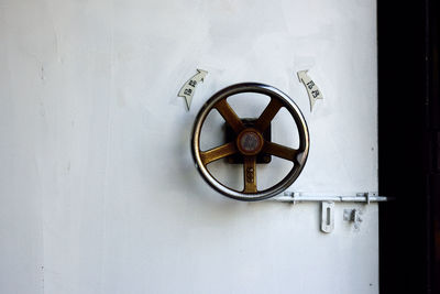 Close-up of clock on wall