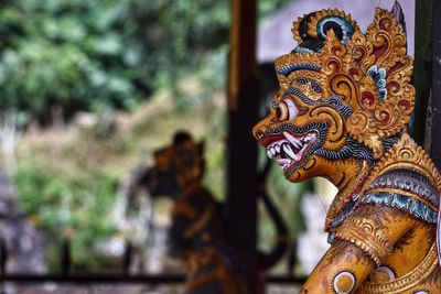 Close-up of statue against blurred background