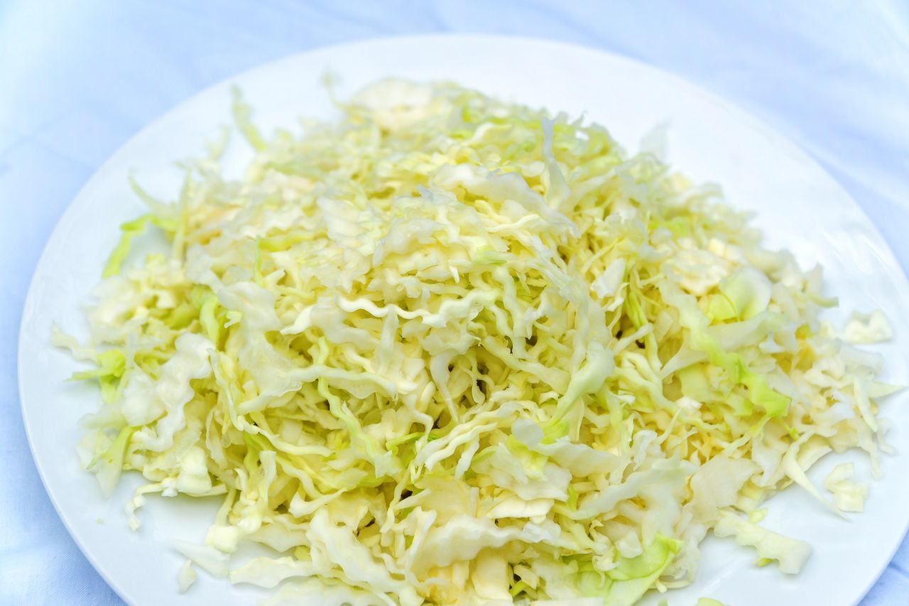 CLOSE-UP OF RICE WITH SALAD IN PLATE