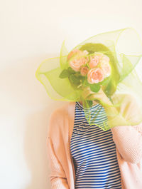 Close-up of rose bouquet against white background