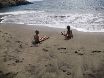 People sitting on beach