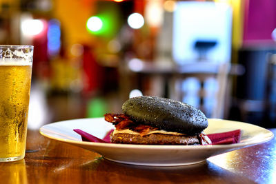 Close-up of beer in glass on table