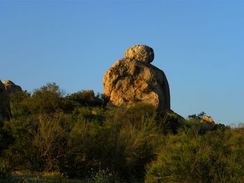 Low angle view of statue against clear sky