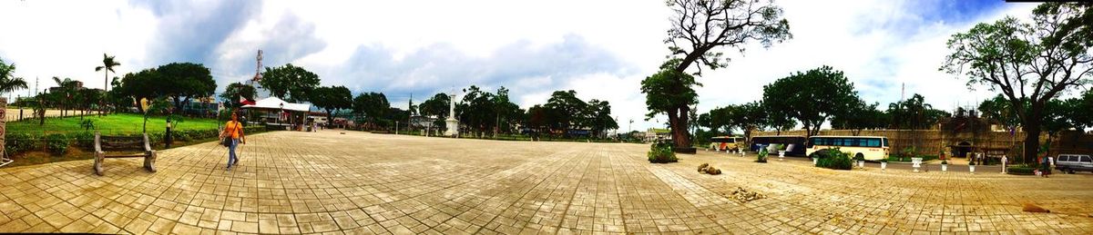Scenic view of landscape against cloudy sky