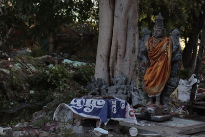 View of buddha statue against trees