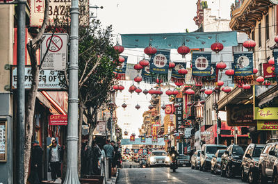 People walking on street in city