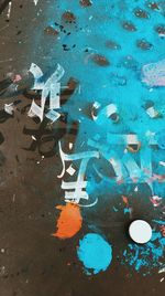 High angle view of paint on footpath