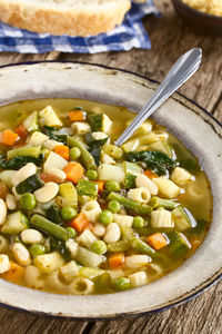 High angle view of chopped vegetables in bowl on table