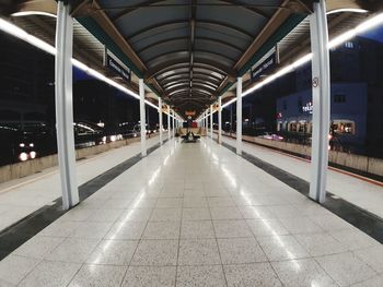 Illuminated railroad station subway  platform