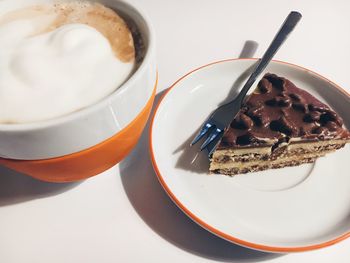 Close-up of coffee served on table