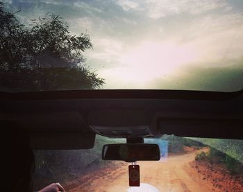 Cropped image of car on road