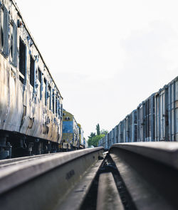 Train on railroad track against sky