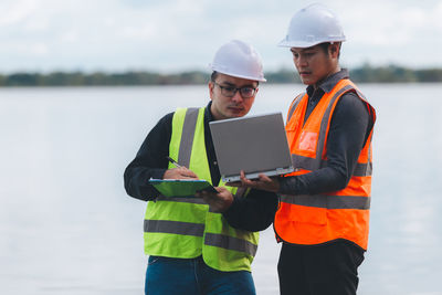 Portrait of man standing on snow