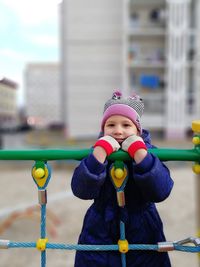 Portrait of cute girl in park during winter