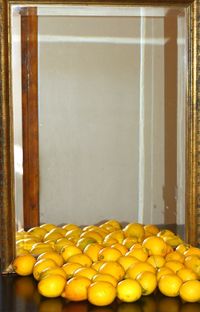 Close-up of oranges on display at store